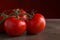 Cluster tomatoes with drops of water