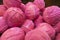 Clustered pink red color bath bomb balls