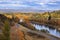 The Clutha River, New Zealand, flowing into the town of Clyde