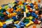 Cluttered pile of colorful toy construction bricks