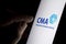 CMA Competition and Markets Authority logo on the screen and finger pointing at it. CMA is a government department also known as