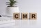 CMR acronym, inscription on wooden blocks. Document for border control