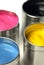 CMYK cans of paint