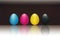 CMYK concept with 3d eggs cyan magenta yellow and black. Black background