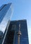 CN Tower reflected in Marsh & McLennan skyscraper in Toronto.