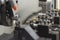 The CNC lathe machine cutting the metal shaft