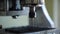 CNC milling metal color machine cut black wood. close up shot of a special equipment for engraving signs or symbols on