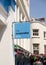 The Co-Operative Bank sign on the High Street in the town of St Pierre Port St Peter Port, the main settlement of Guernsey, The