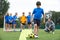 Coach Leading Outdoor Soccer Training Session