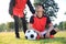 Coach soothing for asian teenager football player
