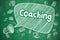 Coaching - Cartoon Illustration on Green Chalkboard.
