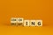 Coaching or delegating leadership style symbol. Turned cubes and changed words `delegating` to `coaching`. Beautiful orange