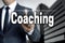 Coaching touchscreen is operated by businessman