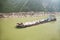 Coal barge sailing along the Yangtze river in