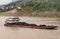 Coal filled barge sails on Yangtze River, China