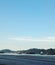 a coal ship crosses the Mahakam river in the afternoon