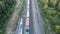 Coal train aerial view. An electric locomotive with freight cars or a railway carriage travels by rail.A train with coal is travel