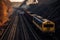 Coal Transport Trains Moving Along Railway Tracks Near Mining Areas. Generative AI
