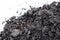 Coarse coal in the snow in winter. Maintaining high temperatures in fuel boilers, home heating systems. Combustible mineral