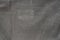 Coarse dark grey fabric textile texture background