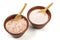 Coarse and fine Himalayan salt in bowls isolated