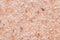 Coarse himalayan pink salt granules macro shot background