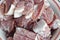 Coarsely chopped pieces of pork. The concept of cholesterol food.  Raw meat before cooking