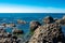 Coast of Atlantic Ocean in Ballycastle Northern Ireland. Summer sunny day, clear blue sky