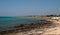 Coast and beach of La Pescoluse a hot summer day.