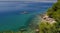 Coast with beautiful deep blue sea in the Pisak village. Croatia. Bihac island on the background.