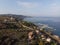 The coast of the Cretan Sea near Heraklion. Top view of the city, sea and road.