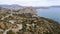 Coast of the Crimea peninsula, rocky mountains, aerial view of the Novy Svet sea resort, mountain serpentine