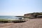 Coast of England with ruins of pier