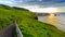 Coast with green grass nearby a carrick-rede-rob, Northern Ireland, UK.