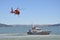 Coast guard helicopter and boat