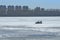 Coast guard hovercraft on the ice of the river