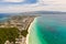 The coast of the island of Boracay. White beach and clear sea. Seascape with a beautiful coast in sunny weather