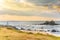 Coast of Itoshima Beach in Fukuoka with Sakurai Futamigaura`s Meoto Iwa Couple Rocks at sunset.