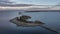 Coast and lighthouse Lange Erik in the north of the island of Öland in the east of Sweden from above during sunset