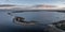 Coast and lighthouse Lange Erik in the north of the island of Öland in the east of Sweden from above during sunset