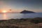 Coast of Lipari with view to volcano islands Salina, Alicudi, Filicudi during sunset, Sicily Italy