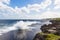 Coast of Pacific ocean with blowholes