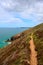 Coast path towards Perranporth beach North Cornwall England UK HDR