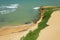 Coast of the peninsula of La Guajira in Colombia. Taroa dunes in the background