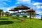 Coast of Porec with parasols on the beach promenade