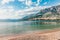 Coast sea and beach below mountain Biokovo in town of Makarska