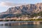 Coast sea and beach below mountain Biokovo in town of Makarska