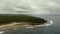 The coast of Siargao island, blue ocean and waves.