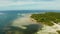 The coast of Siargao island, blue ocean and waves.