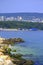 Coast stones,beach and city view